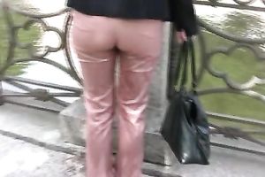 Lena changes her trousers after peeing her panties in the street