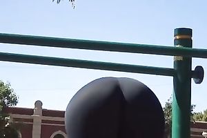 My hot fit GF, wearing legging, takes exercises outdoors