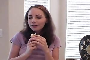 She eats banana and teases camera with gentle bites and licking