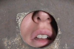 Desirable girl wearing iron head box receives her cookie toyed