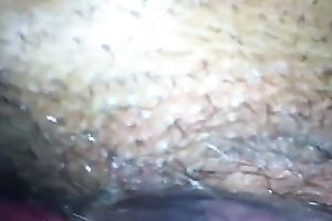 Amateur wench fingers her dark unshaved love tunnel in close up video