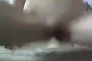 Webcam whore in sunglasses rubs her bald wet crack with a dildo