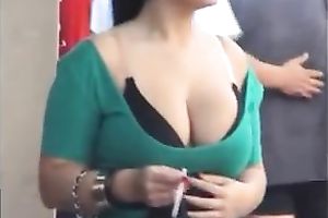 Stunning Latina smokes in the street and teases me with her cleavage