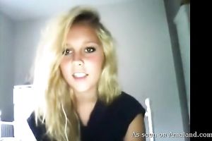 Naughty golden-haired chick disrobes on camera and exposes her bare beauty