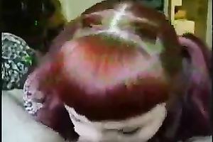 Pigtailed punk bitch is giving me a great blow job in front of a camera