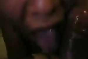 Ebony floozy is glad to engulf 10-Pounder and gulp some sex cream