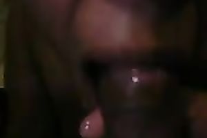 Ebony floozy is glad to engulf 10-Pounder and gulp some sex cream