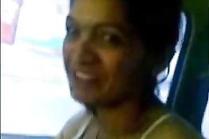 Petite Indian brunette hair cheating wife in the car flashes her gorgeous billibongs