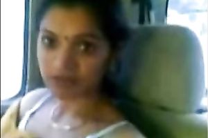 Petite Indian brunette hair cheating wife in the car flashes her gorgeous billibongs