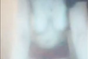 Webcam solo with me demonstrating my large natural jugs