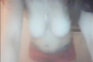 Webcam solo with me demonstrating my large natural jugs