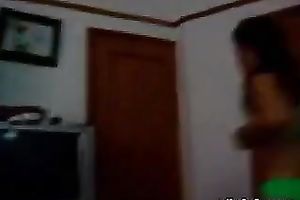 Slim non-professional Indian white bitch is posing for livecam wearing miniature bikini