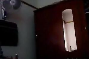 Slim non-professional Indian white bitch is posing for livecam wearing miniature bikini