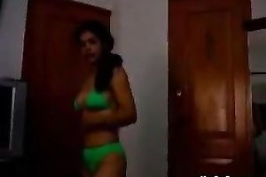 Slim non-professional Indian white bitch is posing for livecam wearing miniature bikini