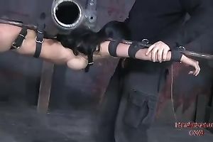 Exotic beauty with large fake boobs is immobilized and sucks master's pecker