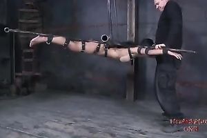 Exotic beauty with large fake boobs is immobilized and sucks master's pecker
