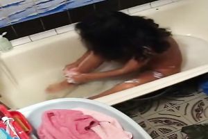 Just a cute Indian young sweetheart in the baths tub on hidden webcam