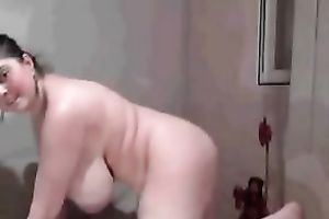 Curvy dark brown milf shows her huge scoops and cum-hole for the webcam