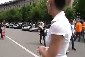 Outdoor scene with a sizzling golden-haired walking in her high heels