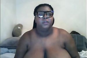 Thick ebony doxy in glasses shows off her massive wobblers and gazoo