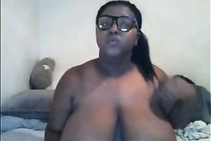 Thick ebony doxy in glasses shows off her massive wobblers and gazoo