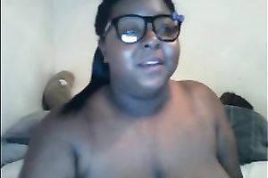 Thick ebony doxy in glasses shows off her massive wobblers and gazoo