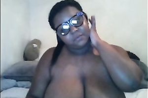 Thick ebony doxy in glasses shows off her massive wobblers and gazoo