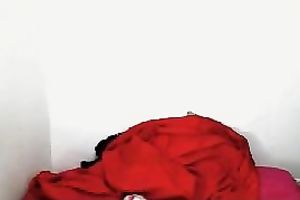 Latina milf shows her arse and bazookas for the camera