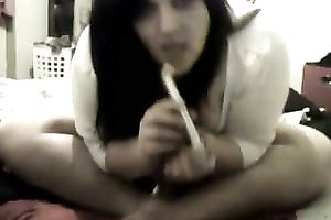 This obese chick is using a thin G-spot stick to reach strong orgasms