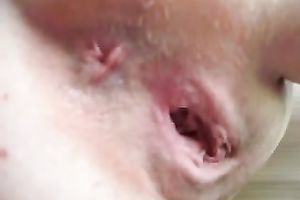 This naughty honey with diminutive pantoons proudly shows off her hairless fur pie