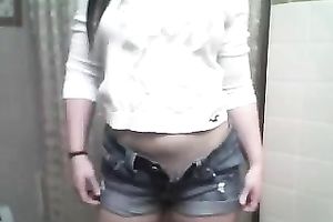 Stripping in front of a web camera and demonstrating my love tunnel