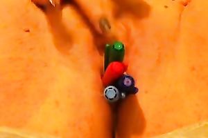 Close up solo movie scene with me stuffing my pussy with markers