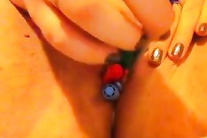 Close up solo movie scene with me stuffing my pussy with markers