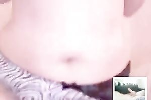 Curvy livecam floozy plays with her large natural breasts