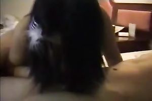 Nasty Chinese coed in red costume performs oral sex sex on her paramour