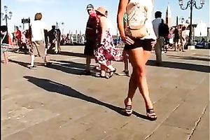 Hot honey in the town center walking in high heel shoes