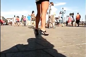 Hot honey in the town center walking in high heel shoes