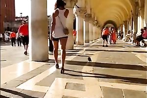 Hot honey in the town center walking in high heel shoes