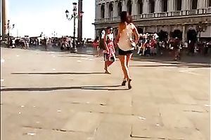 Hot honey in the town center walking in high heel shoes