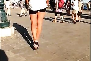 Hot honey in the town center walking in high heel shoes