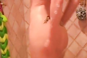 Tattooed redhead playgirl washes her skinny body in the shower