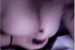 Blonde cutie kneads her natural tits in front of a livecam