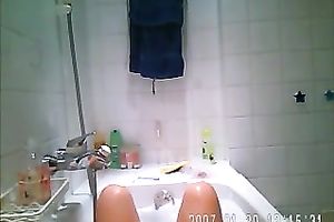 Chubby white slutwife with big breasts in the bathtub on hidden livecam movie scene