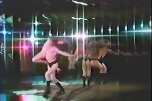Retro harlots dance in a club and show their oral-stimulation skills
