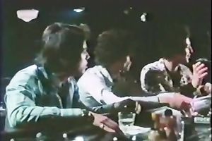 Retro harlots dance in a club and show their oral-stimulation skills