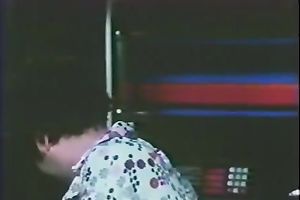 Retro harlots dance in a club and show their oral-stimulation skills