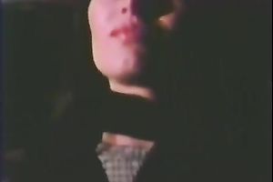 Retro harlots dance in a club and show their oral-stimulation skills