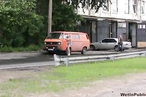 Cute Russian chick walks in public in her moist piddled panties