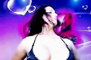 Curly haired beauty loves showing off her large wet zeppelins
