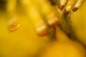 My nasty girl enjoys fingering her wet shaggy love tunnel